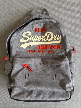 Superdry Grey Backpack with Cream Logo and Orange Accents
